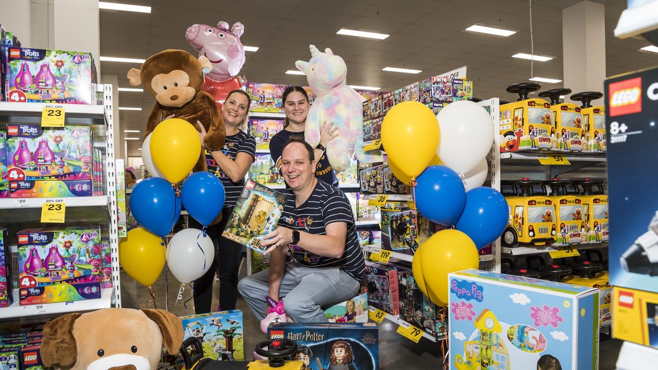 Toy mania for Big W Grand Central staff Corinna Pilling (left), Destiny Teakle and Keiran Jannusch with popular toys in the 2021 Big W Toy Sale, Thursday, June 24, 2021. Picture: Kevin Farmer