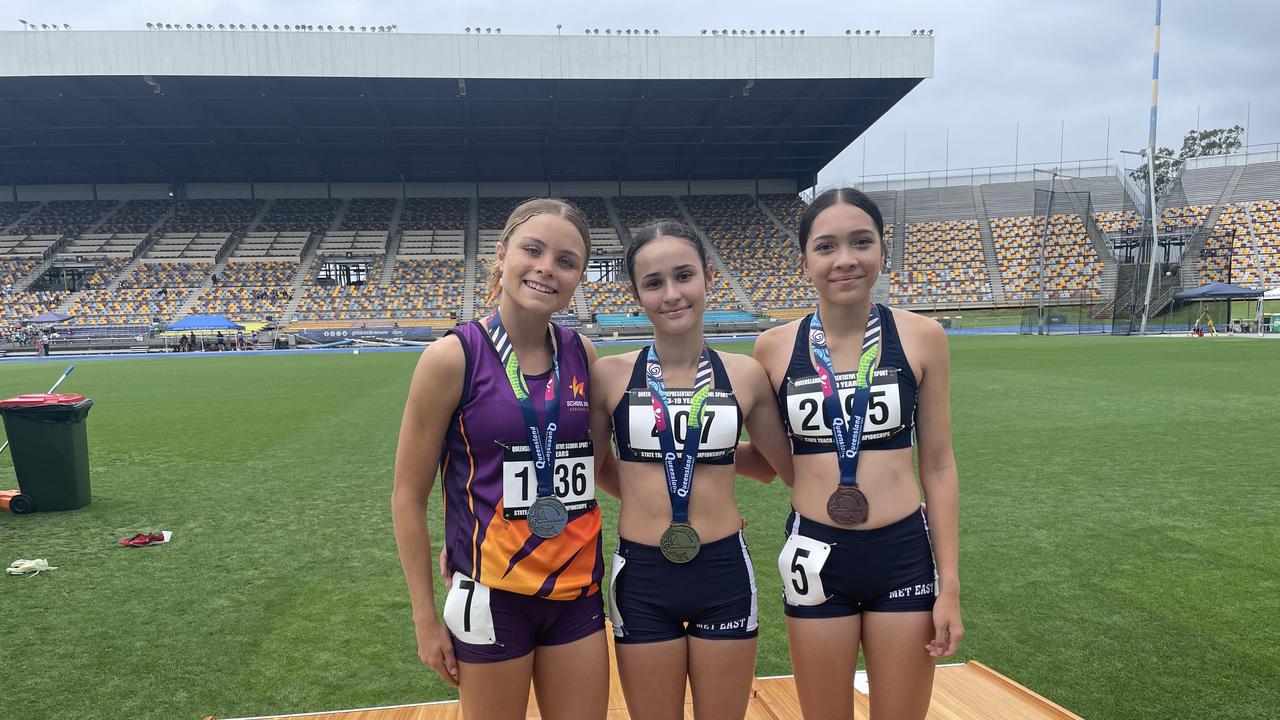 MBC's Ruby Hazell, middle, with Kya Wills-Rawlings and Ysabella Tomkins after their 800m.