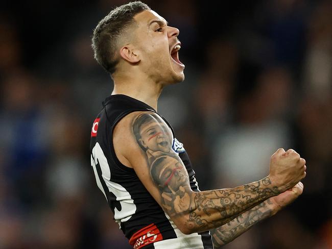 MELBOURNE, AUSTRALIA - JUNE 16: Bobby Hill of the Magpies celebrates a goal during the 2024 AFL Round 14 match between the North Melbourne Kangaroos and the Collingwood Magpies at Marvel Stadium on June 16, 2024 in Melbourne, Australia. (Photo by Michael Willson/AFL Photos via Getty Images)
