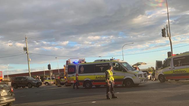 Police guide traffic at the intersection on Sunday.