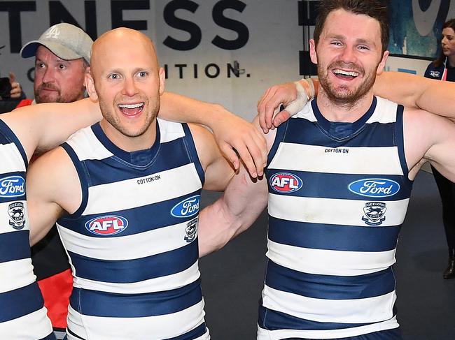 GEELONG, AUSTRALIA - JUNE 28: Jordan Clark, Gary Ablett, Patrick Dangerfield and Tom Stewart of the Cats sing the song in the rooms after winning  the round 15 AFL match between the Geelong Cats and the Adelaide Crows at GMHBA Stadium on June 28, 2019 in Geelong, Australia. (Photo by Quinn Rooney/Getty Images)