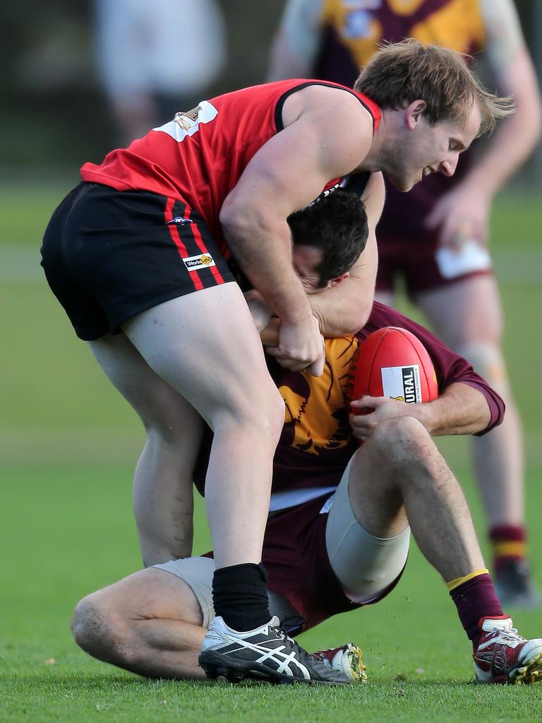 Wimmera Football League round 7 match between Stawell Warriors and Warrack Eagles. Stawell 13. 8 (84) defeated Warracknabeal 11. 13 (79). Cameron Kimbe grabs Christopher Kellett. Picture: Yuri Kouzmin