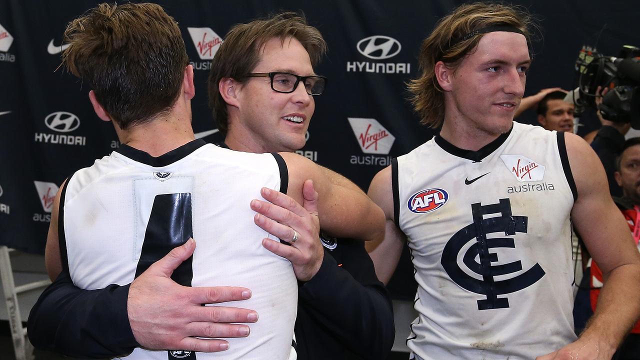 New Carlton coach David Teague and his players celebrate after the comeback win over Fremantle. (Photo by Paul Kane/Getty Images)