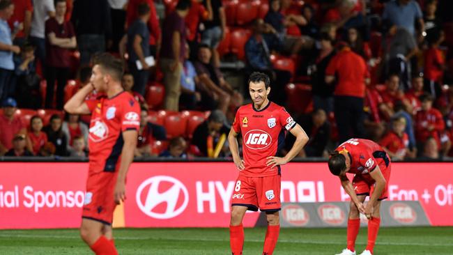 Adelaide United players after losing to Perth Glory in Round 22.