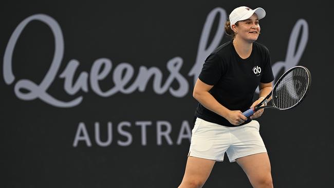 Ash Barty plays doubles with Pat Rafter during the Charity Showcase, Pat Rafter Arena, during the Brisbane International Tennis Tournament, Brisbane. pic: Lyndon Mechielsen