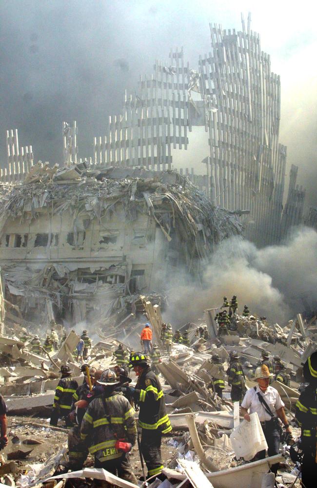 Ashell of what was once part of the facade of one of the twin towers of New York's World Trade Center rises above the rubble that remains after both towers were destroyed in the terrorist attacks. Picture: AP