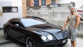 Hakan Ayik with a luxury car. Picture: News Corp Australia