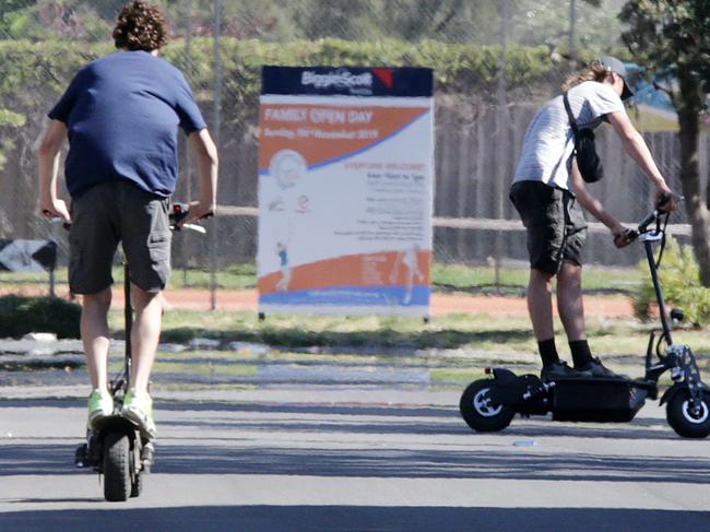 Teens on electric scooters disrupt a monkey bike protest on Hallifax St Seaford. Picture Norm Oorloff