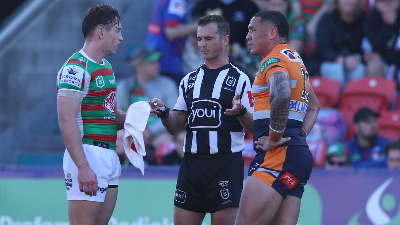 Referee Grant Atkins (C) has been relegated to Bunker duties for three weeks. Picture: Scott Gardiner/Getty