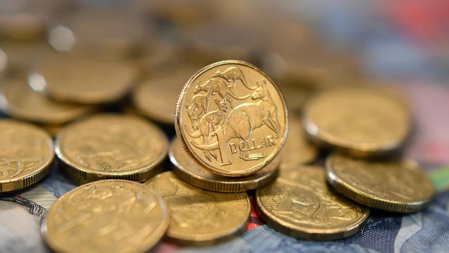 Australian dollars in Sydney, Friday, September 22, 2017. The Aussie dollar remained below 80 US cents on Friday morning with lower iron ore prices lower, signals that a US interest rate hike was coming. (AAP Image/Joel Carrett) NO ARCHIVING