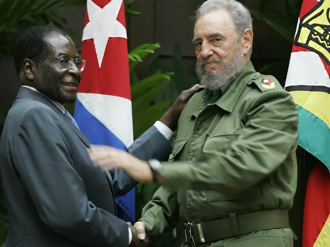 President of Zimbabwe Robert Mugabe meets with CubanpPresident Fidel Castro at the State Council in Havana in Sseptbemr 2005. Picture: AFP Photo