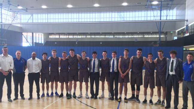 Churchie celebrate winning back-to-back GPS Basketball premierships.