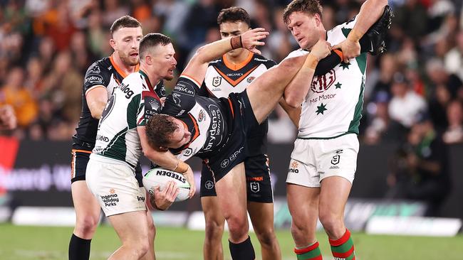 Tigers hooker Jacob Liddle is upended by the Bunnies’ defence. Picture: Mark Kolbe/Getty Images