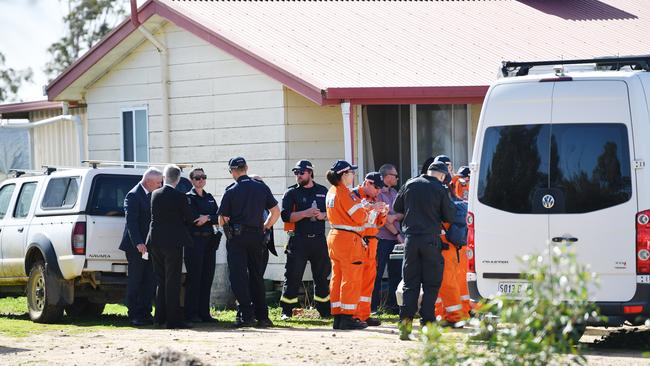 Major Crime detectives and SES search a property in Pinkerton Plains, north of Adelaide, in May last year over the suspected murder of Michael Purse. Picture: AAP / David Mariuz