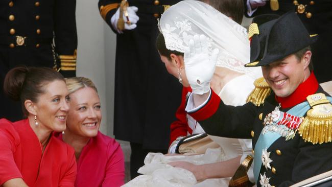 Royal bridesmaid Amber Petty (second from left) says losing her best friend, Princess Mary, to the people of Denmark prompted her to seek guidance from the spiritual world.