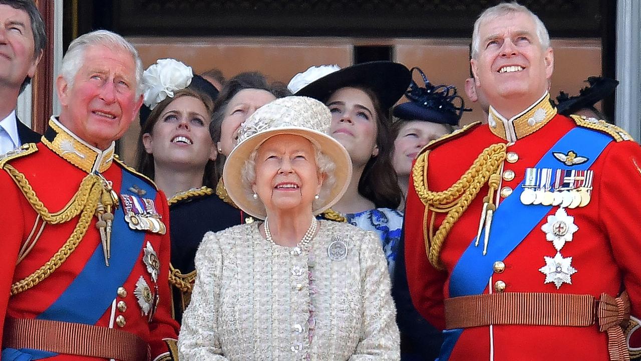 Prince Charles, Queen Elizabeth and Prince Andrew during simpler times last June. Picture: Daniel Leal-Olivas/AFP