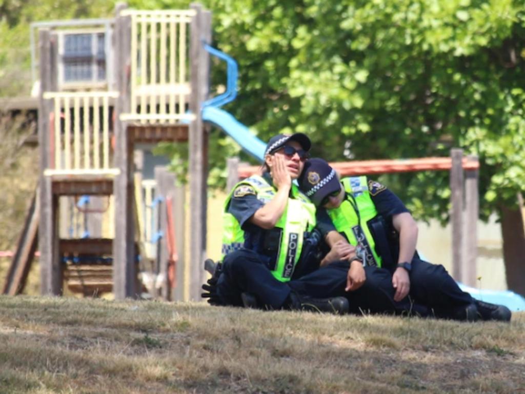 Heartbroken police officers comforted each other at the scene. Picture: ABC News