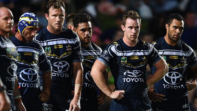 The players’ faces say it all. (Ian Hitchcock/Getty Images)