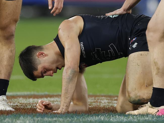 NCA. MELBOURNE, AUSTRALIA. June 8th , 2025 . AFL Round 13. Carlton vs Essendon at the MCG .    Adam Cerra of the Blues on there ground after a big collision with Sam Durham of the Bombers  during the 2nd qtr.     . Picture: Michael Klein