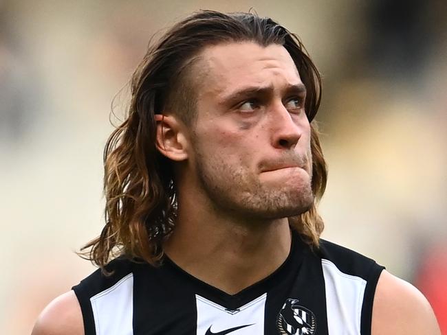 MELBOURNE, AUSTRALIA - MAY 01: Darcy Moore of the Magpies looks dejected after losing the round seven AFL match between the Collingwood Magpies and the Gold Coast Suns at Melbourne Cricket Ground on May 01, 2021 in Melbourne, Australia. (Photo by Quinn Rooney/Getty Images)