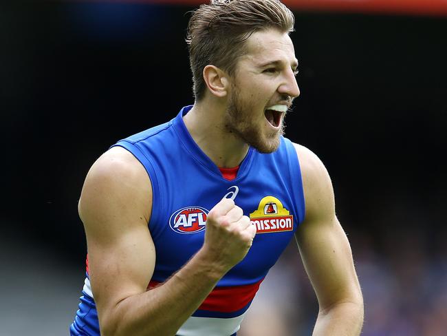 AFL Round 2. Western Bulldogs v West Coast Eagles at Etihad Stadium.  Western Bulldogs Marcus Bontempelli celebrates his goal in the first quarter . Pic: Michael Klein