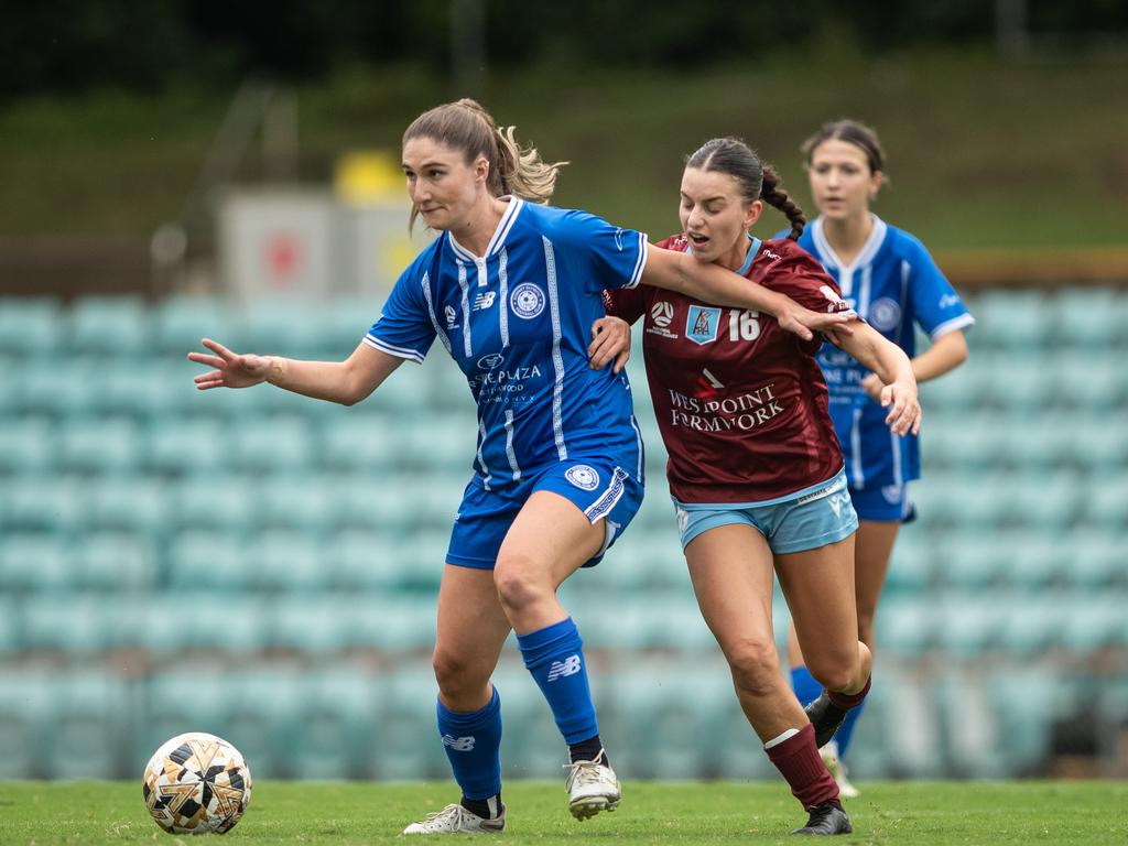 APIA’s Estelle Fragale fighting for the ball against Demi Koulizakis. Picture: Julian Andrews