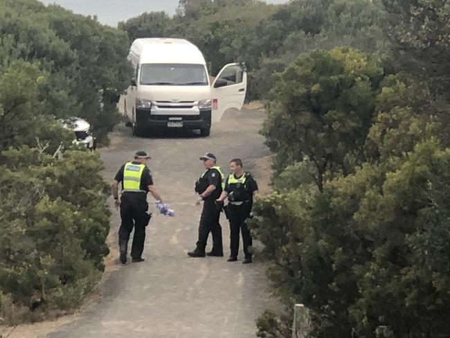 Police gather evidence soon after the body was found. Picture: Mandy Squires