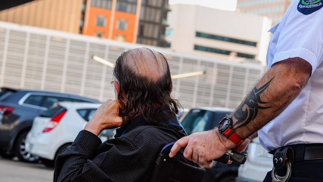 Perre looks toward the former NCA office from the roof of a multi level carpark in Pitt St during his trial. Picture: NCA NewsWire / Brenton Edwards