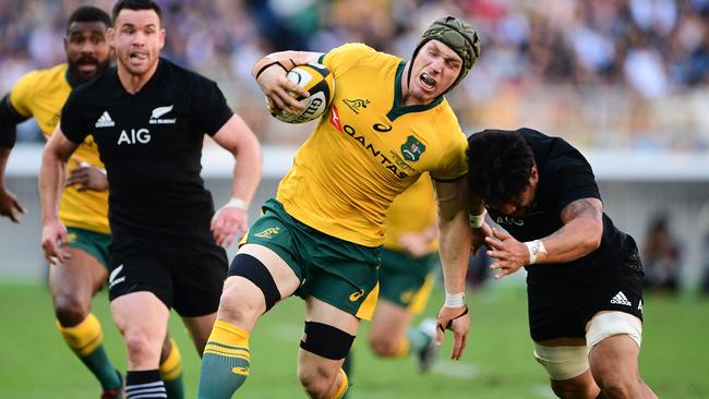 David Pocock taking on the All Blacks in Tokyo last year. Picture: AFP 