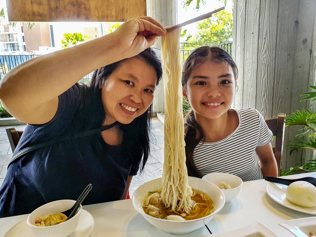 Anna Lee and Zoe Carroll enjoy longevity noodles at Din Tai Fung in Miranda Westfield. Picture: Supplied