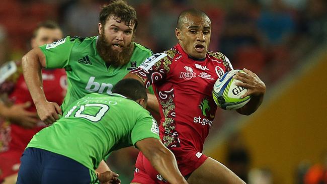 Qld Reds vs The Highlanders, at Suncorp Stadium. Will Genia breaks through. Pic Jono Searle