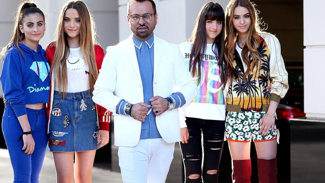 Cosmetics giant Napoleon Perdis and his four daughters, Lianna, far right, and triplets from left, Angelene, Athina and Alexia.