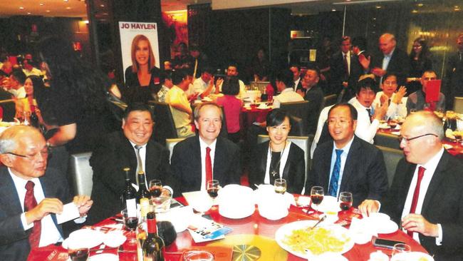 <s1 class="crosshead12">Wrong and Shorten soup: </s1>A photo shown during the ICAC inquiry of a 2015 Chinese Friends of Labor fundraiser showing former ALP federal leader Bill Shorten (centre) with former ALP upper house MP Ernest Wong next to him on the left. Former state ALP leader Luke Foley (far right) is seated next to Chinese property developer billionaire Huang Xiangmo.