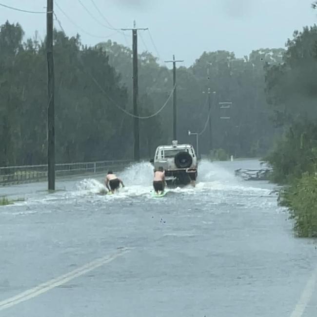 Some watersports on floodwater at Wyampa Rd, Bald Hills.