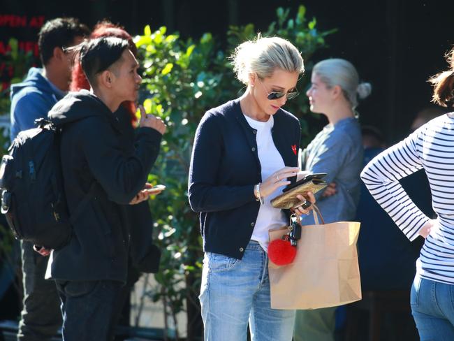 Jacenko got some take away coffee and food in Bondi today before the 60 Minutes episode went to air. Picture: Cameron Richardson.