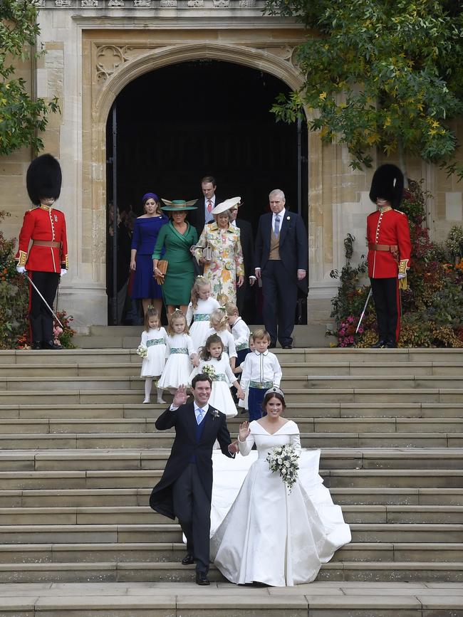 Britain's Princess Eugenie and Jack Brooksbank leave St George's Chapel as husband and wife. Picture: AP