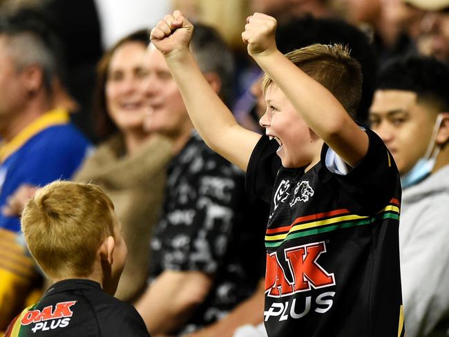 MACKAY, AUSTRALIA - SEPTEMBER 18: Panthers supporters cheer during the NRL Semifinal match between the Penrith Panthers and the Parramatta Eels at BB Print Stadium on September 18, 2021 in Mackay, Australia. (Photo by Matt Roberts/Getty Images)