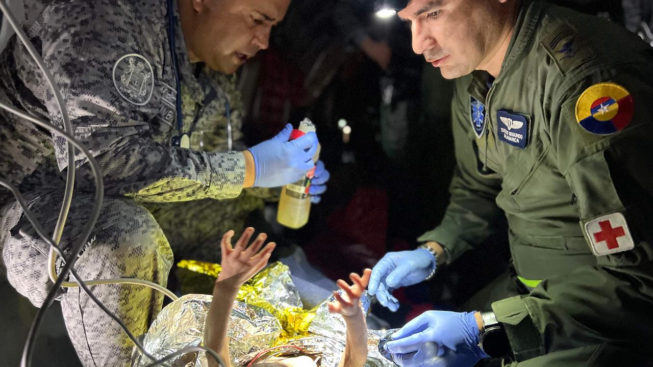 The eldest child, Lesly, 13, was praised for keeping the one-year-old alive. Picture: Prensa presidencial / Colombian Presidency / AFP