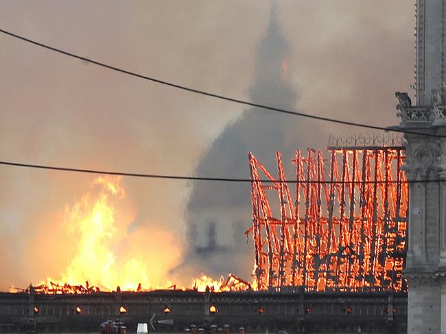 Flames rise from Notre Dame cathedral as it burns in Paris, Monday, April 15, 2019. (AP Photo/Thibault Camus)