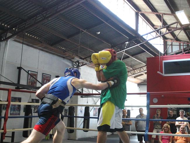 Jeff Horn lands a body shot on Anthony Mundine during sparring. Picture: Annette Dew