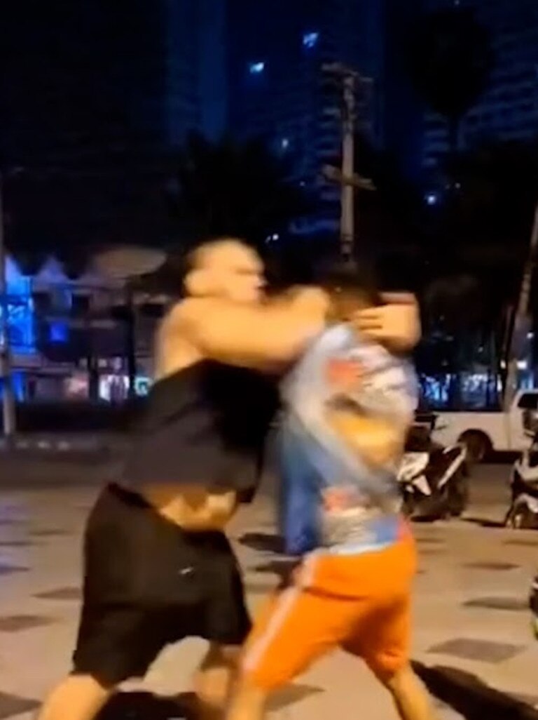 The confrontation quickly escalated as punches were thrown. Picture: Asia Pacific Press