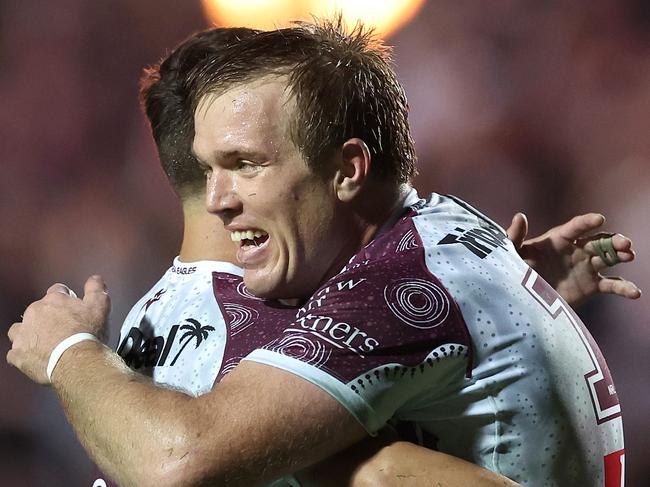 SYDNEY, AUSTRALIA - MAY 24:  JakeÃÂ Trbojevic and LukeÃÂ Brooks of the Sea Eagles celebrate winning the round 12 NRL match between Manly Sea Eagles and Melbourne Storm at 4 Pines Park on May 24, 2024, in Sydney, Australia. (Photo by Cameron Spencer/Getty Images)