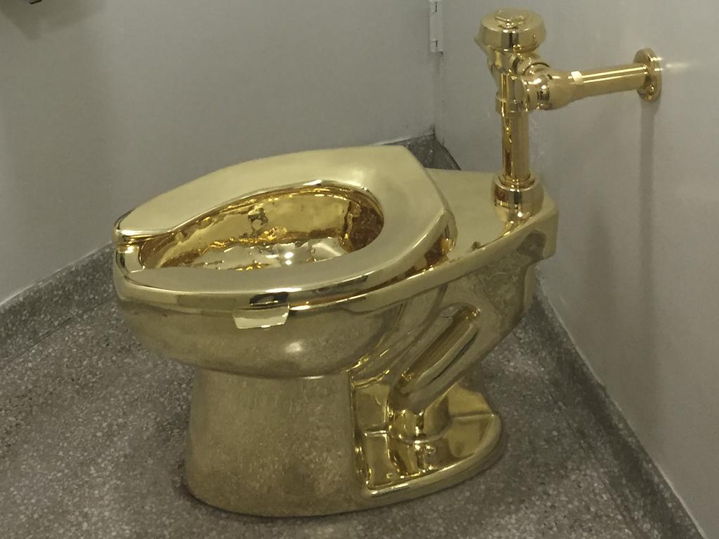 This fully-functioning, solid gold toilet, made by Italian artist Maurizio Cattelan, was put into public use at the Guggenheim Museum in New York in 2016. Picture: William Edwards/ AFP