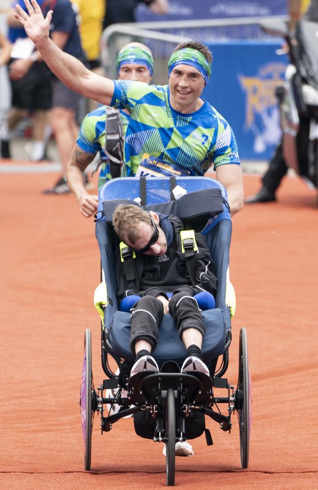 Rob Burrow and Kevin Sinfield approach the finish line. (Photo by Danny Lawson/PA Images via Getty Images)