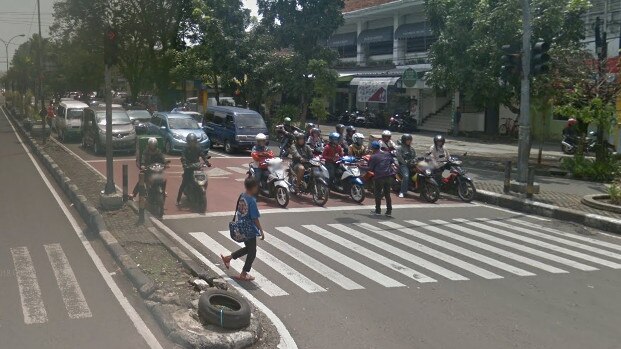 A motorcycle box or zone in operation in Bandung, Indonesia. 