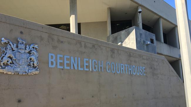 A Brisbane man has been slammed by a magistrate after slapping a woman holding a baby, along with his seventh disqualified driving offence.