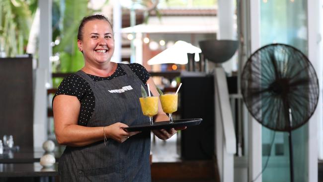 With the Queensland border opening to all Australian States except Western Australia on Monday, the seaside suburb of Palm Cove has experienced a surge in forward bookings in accommodation and restaurant tables. Nu Nu waiter Karen Chlopicki expects to see an increase in diners this week. Picture: Brendan Radke