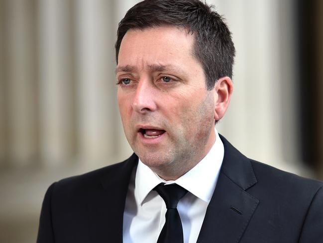 MELBOURNE, AUSTRALIA - SEPTEMBER 9TH, 2022:  Leader of the Opposition Matthew Guy, addresses the media outside Parliament House in Melbourne, where the flags are flying half mast after the death of Queen Elizabeth II.Picture: Nicki Connolly