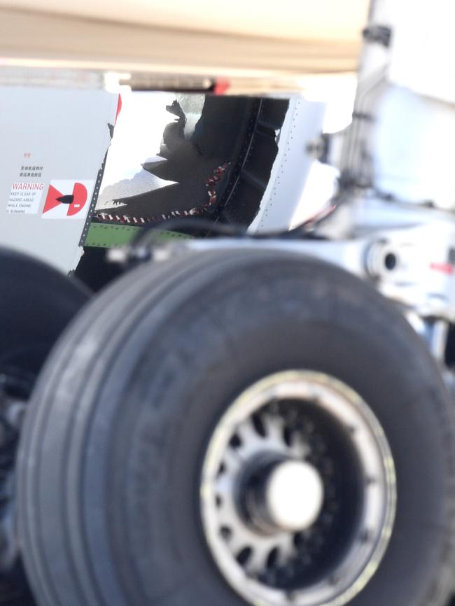 Damage to a China Eastern airlines’ A330 that suffered an “engine malfunction” after takeoff from Sydney. Picture: AAP/Paul Miller