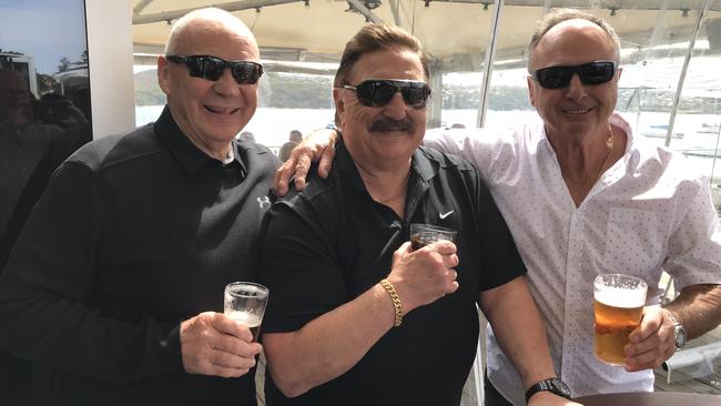 Peter Peters (centre) with Manly legends Bob Fulton and Max Krilich.